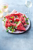 Rum-spiked watermelon slices