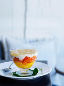 Tropical fruit cup with coconut cream and finger lime jelly