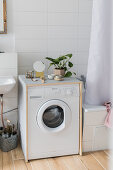 Washing machine in DIY wooden cabinet