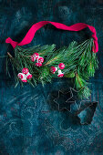 Garland of pine twigs with toadstool decorations