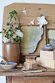 Decorative still life with honeycombs, notebook, and cardboard boxes