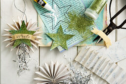 Handmade paper stars decorated with glitter