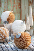 Christmas tree ornaments made from pleated accordion paper