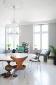 Round table with classic chairs in the dining area