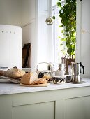 Sliced bread, coffee and everything for breakfast on the kitchen counter