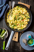 Scrambled eggs with potatoes and pepper