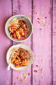 Sweet potatoes and chocolate cream with muesli and plums