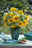 Lush bouquet of sunflowers, meadow chervil and wild carrot