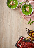 Cold pea soup with smoked shredded chicken, Barbecue pork ribs with baby marrow chips