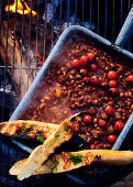 Smoky cowpea 'baked beans' with toasted baguette