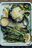 Grilled broccoli and asparaguswith grated cheddar cheese