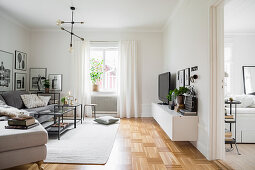 Classic monochrome living room with parquet floor