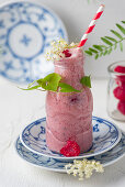 A raspberry smoothie with elderflower