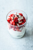 Strawberry quark with coconut in a glass