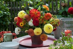 Yellow-red bouquet of dahlias and sun bride
