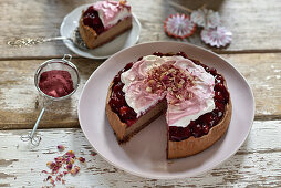 Vegan nougat cheesecake with raspberries and cream