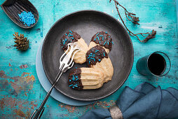 Vegan shortbread cookies with dark chocolate and sprinkles