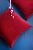 Hand-sewn red corduroy cushion covers