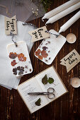 Gift tags and handmade scented wax tablets with flowers and leaves