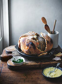 Whole salt-baked pumpkin with raclette cheese sauce