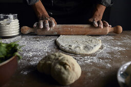 Rolling out sourdough with a rolling pin