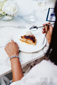 A slice of tarte tatin with cinnamon ice cream