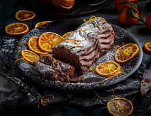 insta Chocolate log with hints of orange orange peel with icing sugar dusting