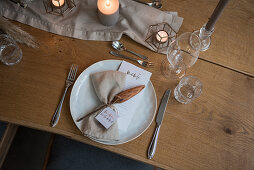 Wedding place setting in natural shades with greeting