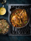 Preserved lemon poussin with tabbouleh and saffron yogur