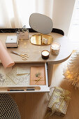 Stationary in open drawer of modern dressing table
