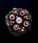 Advent wreath with four burning candles