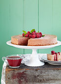 Chocolate cheesecake with raspberry sauce and raspberries