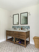 Twin sinks on washstand in bathroom