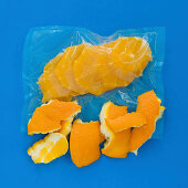Orangenscheiben vakuumverpackt in Plastikbeutel