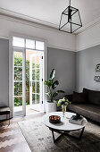 Two-tone wall in elegant living room in shades of grey