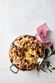 Grape focaccia with baked camembert, walnuts and olives