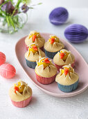 Easter cupcakes decoration with marzipan chicks