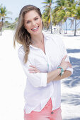 A long-haired woman wearing white shirt