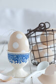 Blown egg decorated with white spots