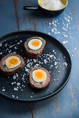 Meat roulade filled with hard-boiled egg and spinach