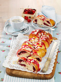 Yeast dough plait with a cherry filling