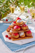 Mille Feuille with cream puffs and a raspberry glaze