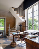 Winding staircase in classic living room of period building