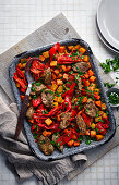 Spicy pork, sweet potato and squash tray bake