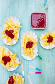 Vegan pineapple fries with raspberry sauce