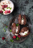 Chocolate ice cream sandwich with raspberries