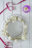 White tulips in willow wreath