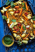 Roast potatoes with carrots, lime, coriander