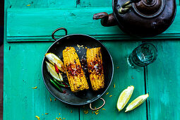 Bhutta (grilled corn on the cob, India)