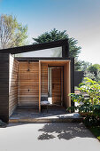 Outdoor shower next to the front door in the modern architect's house